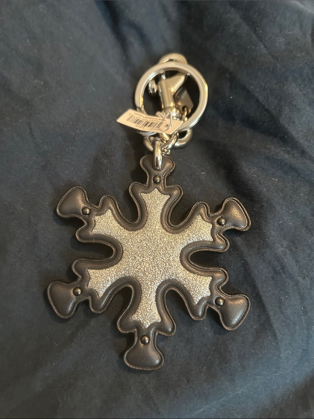 Leather-Trim Snowflake Keychain in Metallic Silver